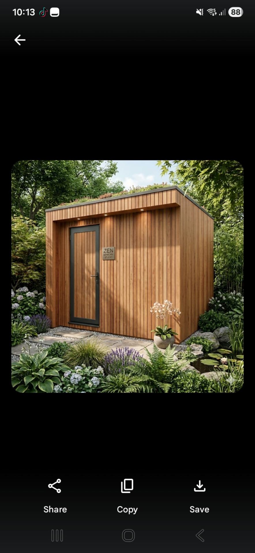 Outdoor Zen Sensory Studio, a wooden garden POD surrounded by planting